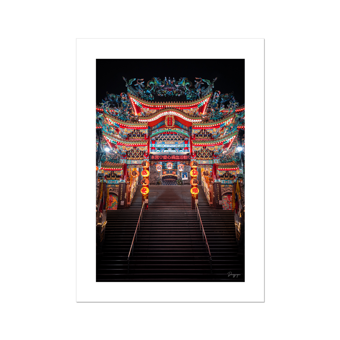 A fine art print showing a very impressive Taoist temple with lights that are glowing in the night in Taipei Taiwan