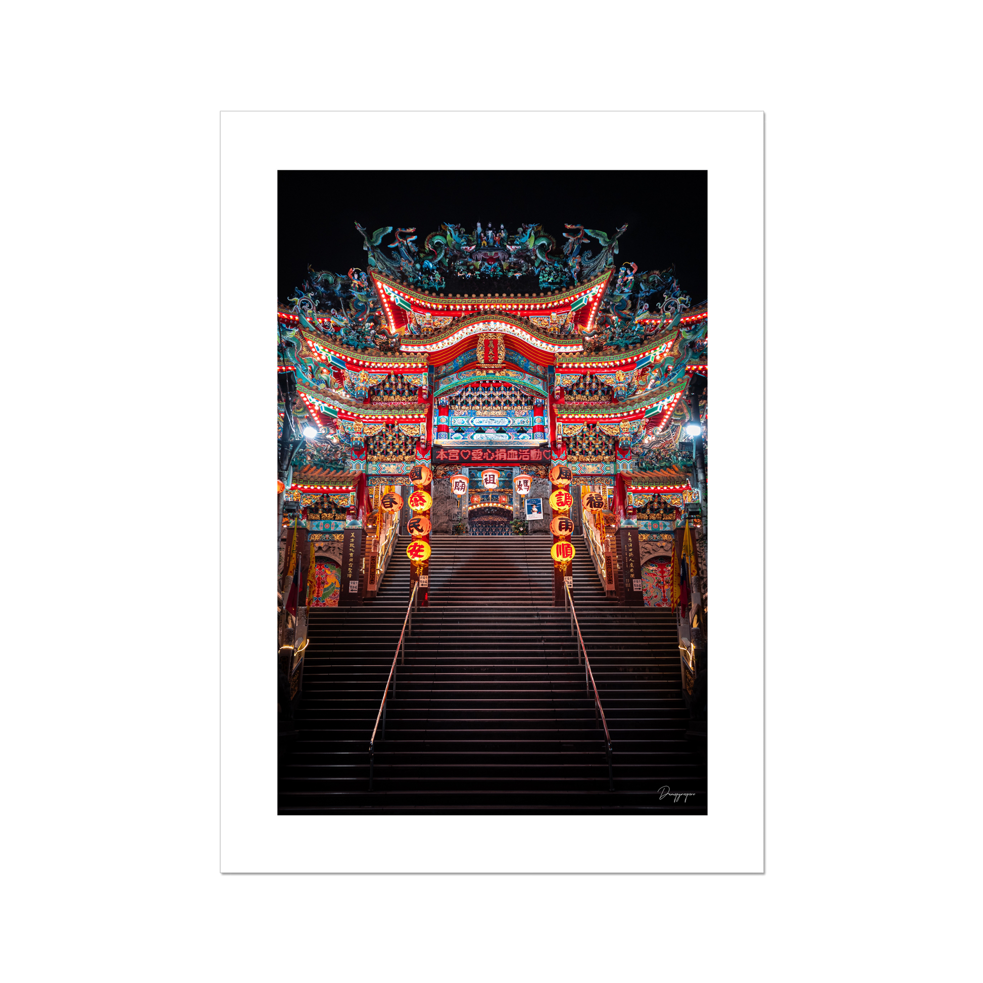 A fine art print showing a very impressive Taoist temple with lights that are glowing in the night in Taipei Taiwan